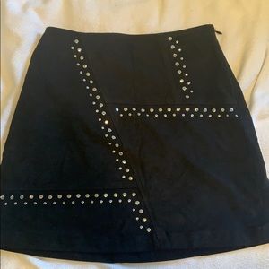 Black mini skirt with studs